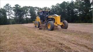 Deere 672G Motor Grader Grading Field [upl. by Gebhardt978]